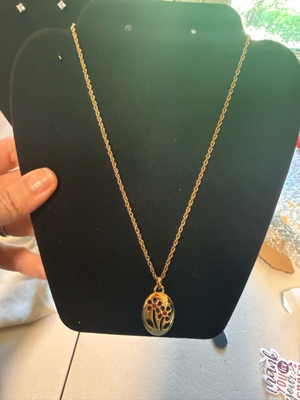 Monet Gold-Tone Oval Floral Open Work Necklace with Red Accents. 14k gold plated